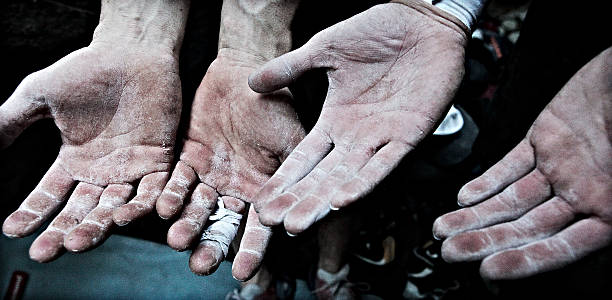 Climber's hands stock photo