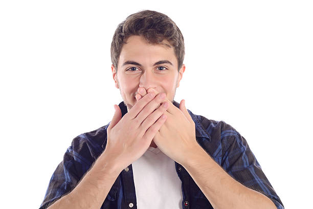 istock Man covering his mouth. 625596570