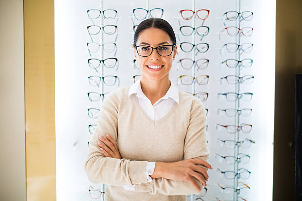 istock Woman wearing eyeglasses at the optical store 625597552