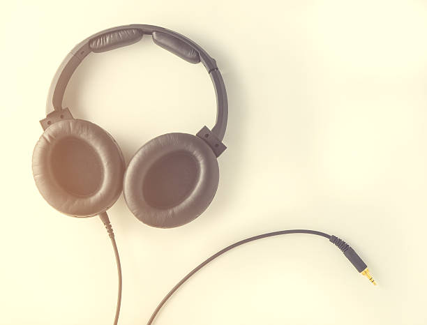 istock black headphone with wired jack in vintage tone 625597842