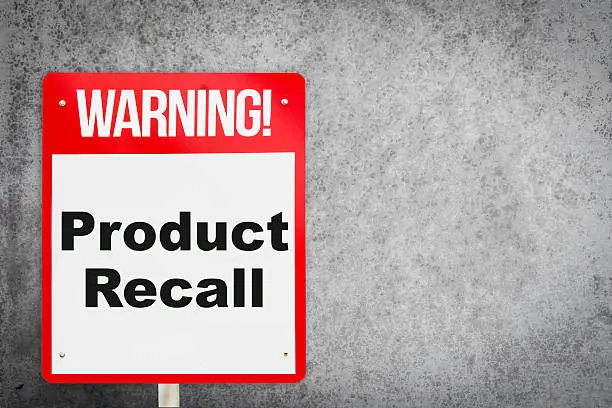 Photo of Product Recall problem warning signage for production industry.