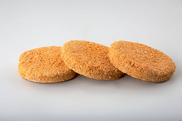 istock Frozen semi-finished cutlets in the shape of a circle 625602340