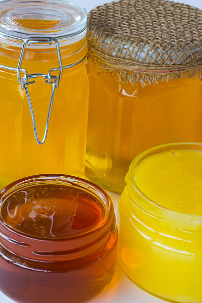 istock Different varieties of honey in jars 625604638