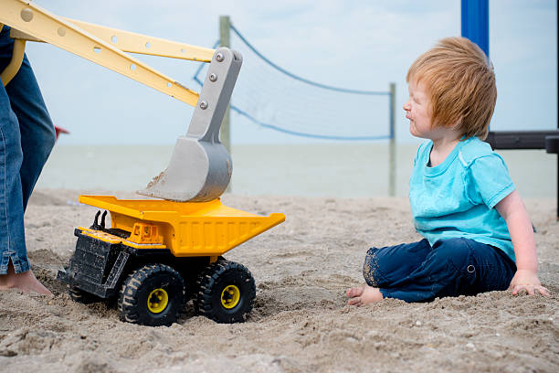 istock Playing with a truck and scoop 625607148