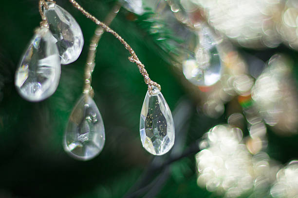 istock Christmas tree background with bright diamond and golden ornaments 625623950