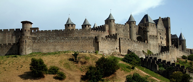 Carcassone, France - July 26, 2012: Medieval citadel of Carcassonne. Carcassonne is in the Aude department and chief town of the Languedoc-Roussillon region in the south-west France. Its historic center consists of a walled medieval citadel protected by UNESCO since 1997.