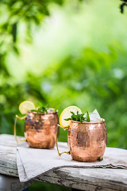istock Moscow mules cocktail in copper mugs 625624462