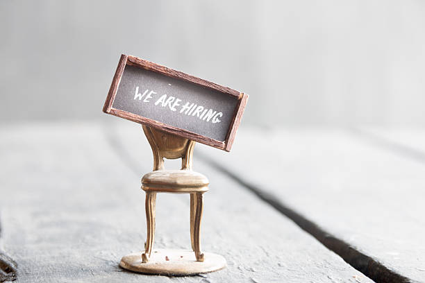 istock We're hiring written on chalkboard and chair 625627576