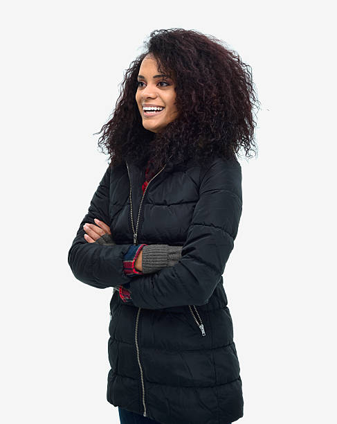 istock Cheerful woman standing with arms crossed 625643404
