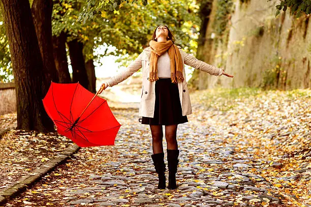 Photo of Woman with red umbrella