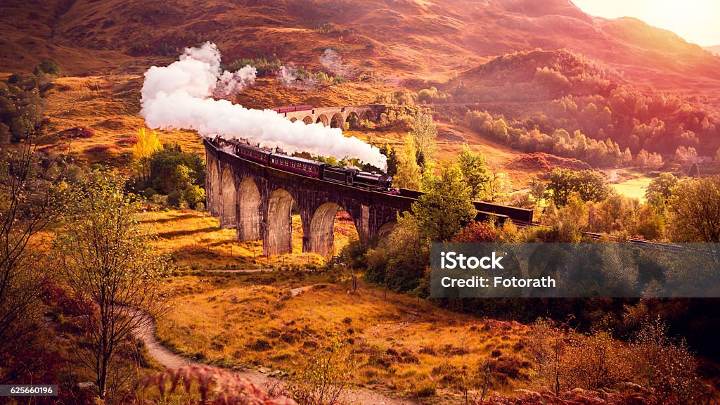 Historical Steam Train is crossing the Glenfiann Viaduct This shot was taken in Scotland   Train - Vehicle Stock Photo