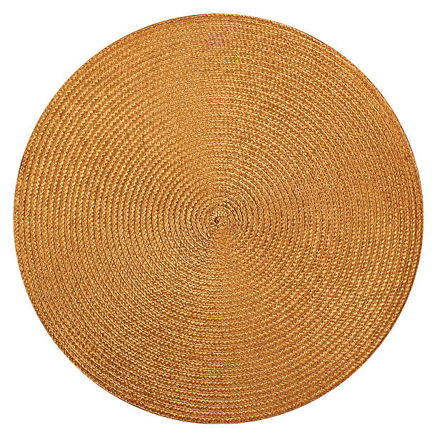 round woven straw mat isolated on white background - woven wood textured place mat imagens e fotografias de stock