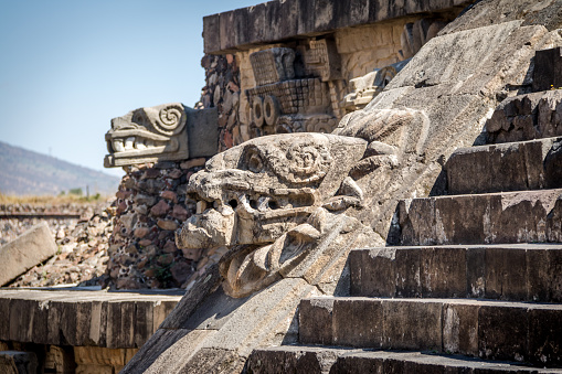 Carving details of Quetzalcoatl Pyramid at Teotihuacan Ruins - Mexico City, Mexico