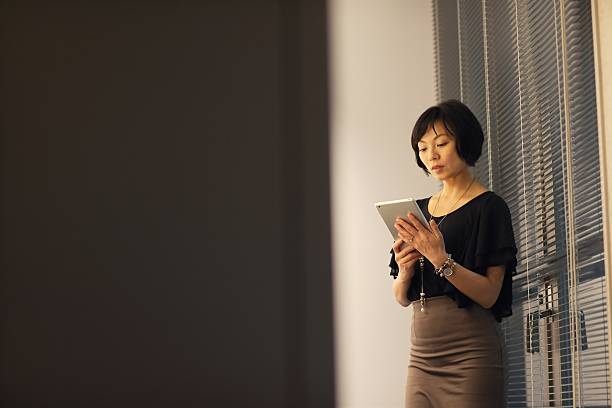istock Japanese lady works at office 625662766