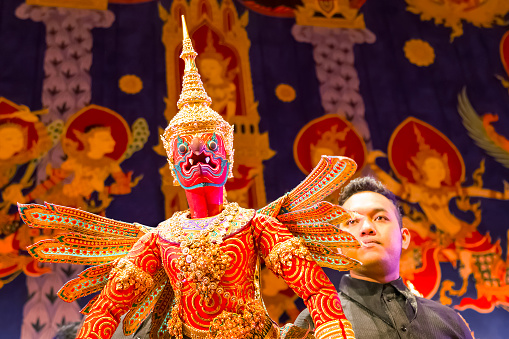 Bangkok, Thailand - January 16 2016: Thai traditional puppet play displayed openly for public at Thai Cultural Center in a campaign for the conservation of Thai traditional performing arts