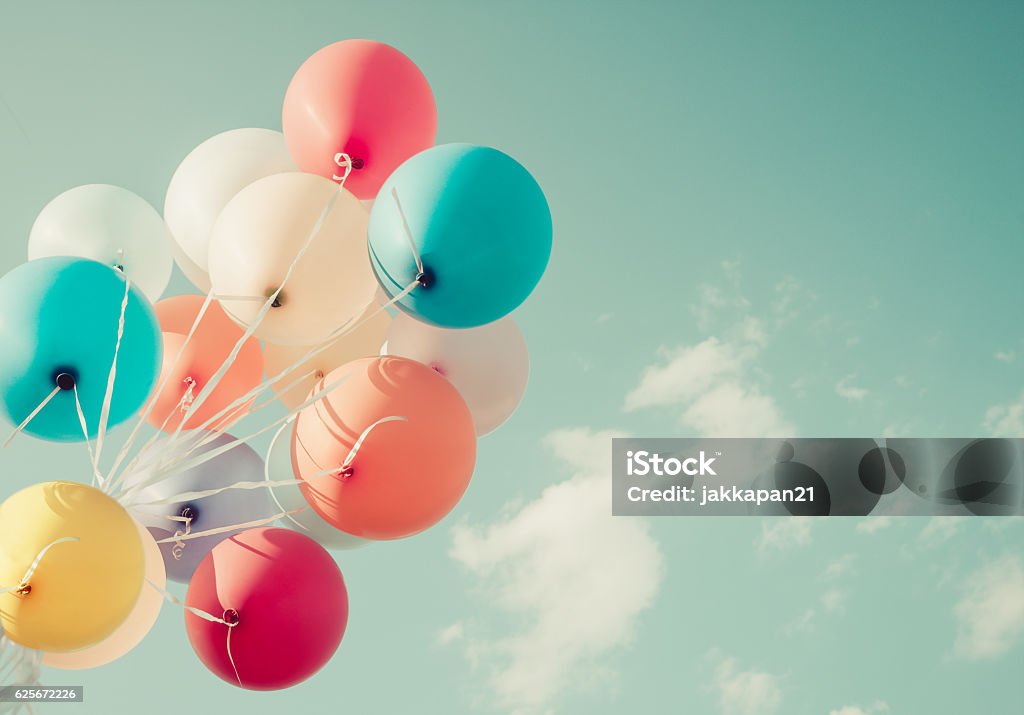colorful balloon colorful balloons. happy birthday party in summer holidays - vintage pastel color styles. Balloon Stock Photo