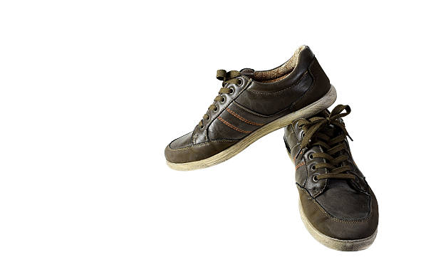 istock Old shoes isolated on white background. 625672246