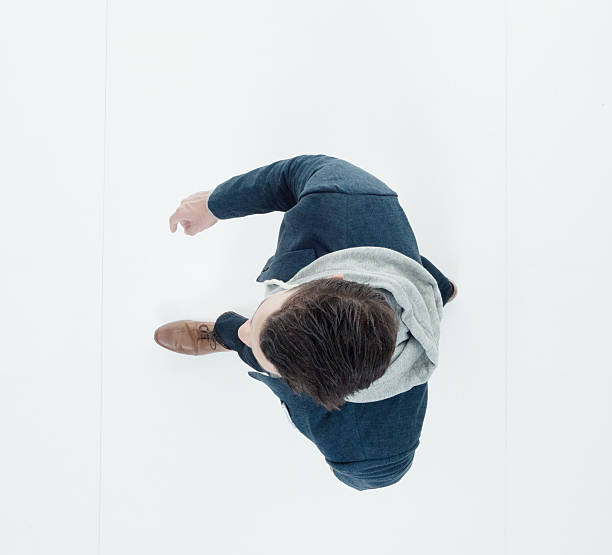 istock Above view of man walking 625673102