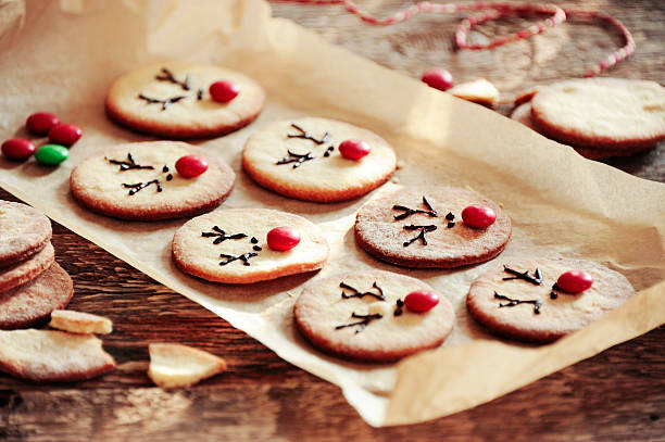 Reindeer cake Christmas treat for kids on a wooden table stock photo