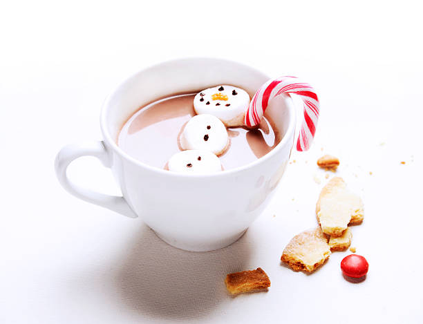 hot chocolate with marshmallow snowman Christmas time stock photo