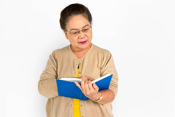 istock Woman Reading Book Portrait Concept 625675484