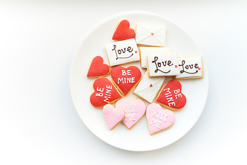 High angle view of cute cookies for Valentines Day on plate