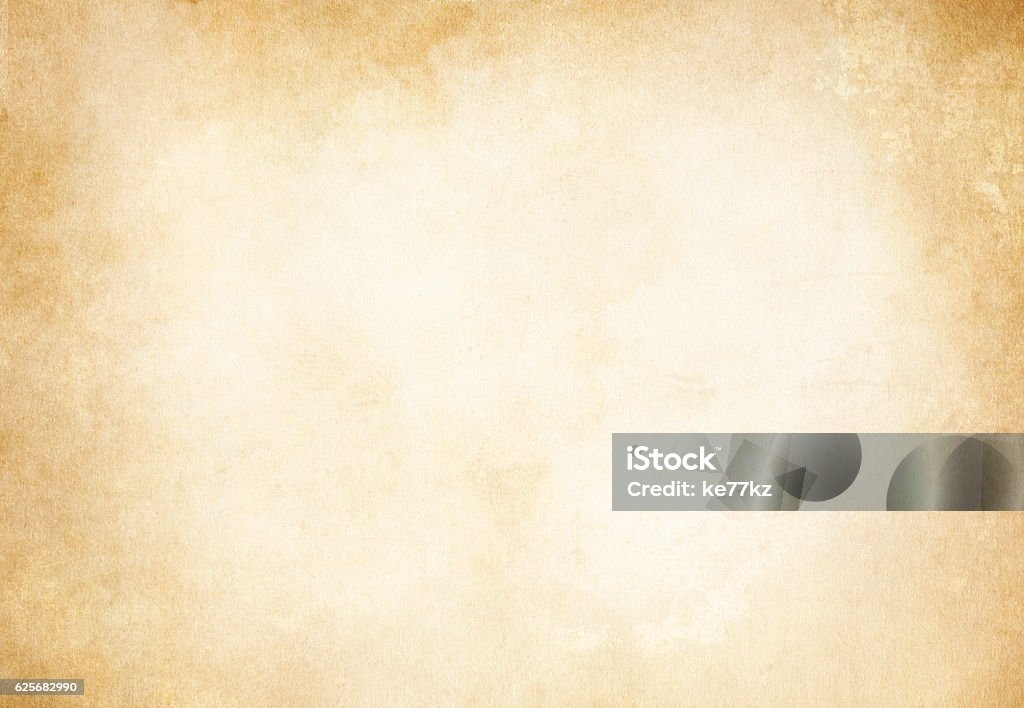 Old grunge paper texture or background. Aged grunge and yellowed paper background for the design. Paper Stock Photo