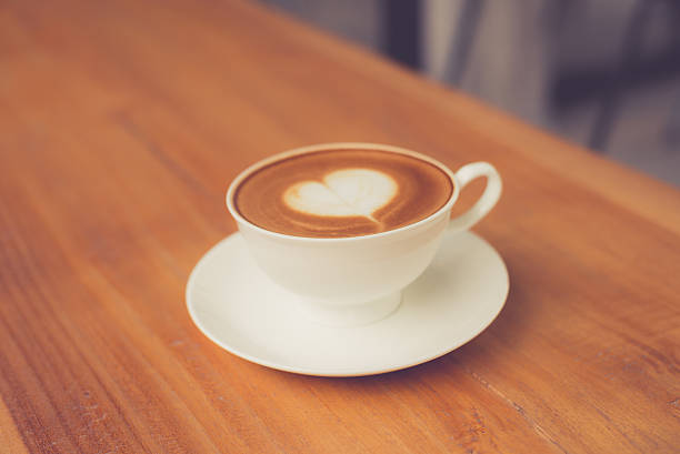 istock A cup of coffee latte made with vintage filter. 625683850