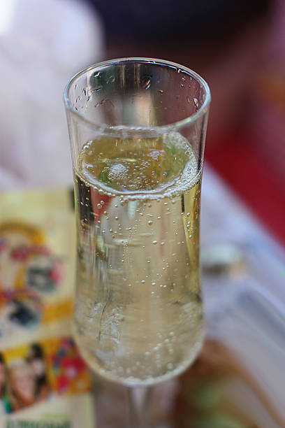 istock Elegant champagne glass with sparkles and bubbles 625685418