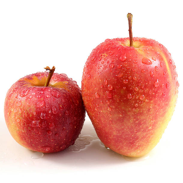 istock Big and little apples 625688318