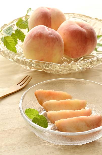 istock Peaches in glass bowl 625688812