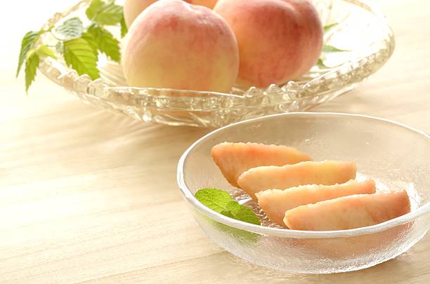 istock Peaches in glass bowl 625688944