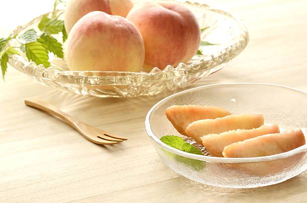 istock Peaches in glass bowl 625689010