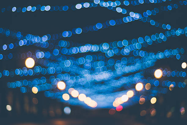 istock Winter holidays illuminated street in bokeh 625690090