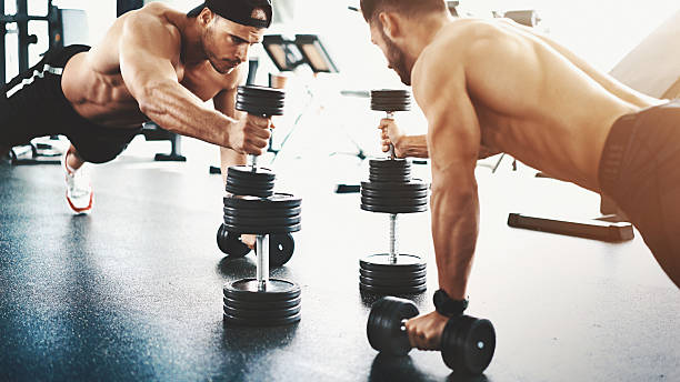 push up round in a gym. - men baseball cap focus determination imagens e fotografias de stock