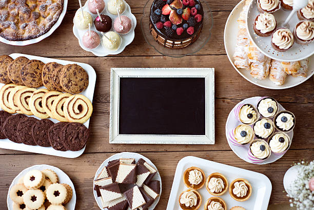 istock Picture frame and cake, cookies, tarts, cupcakes. Copy space. 625703958
