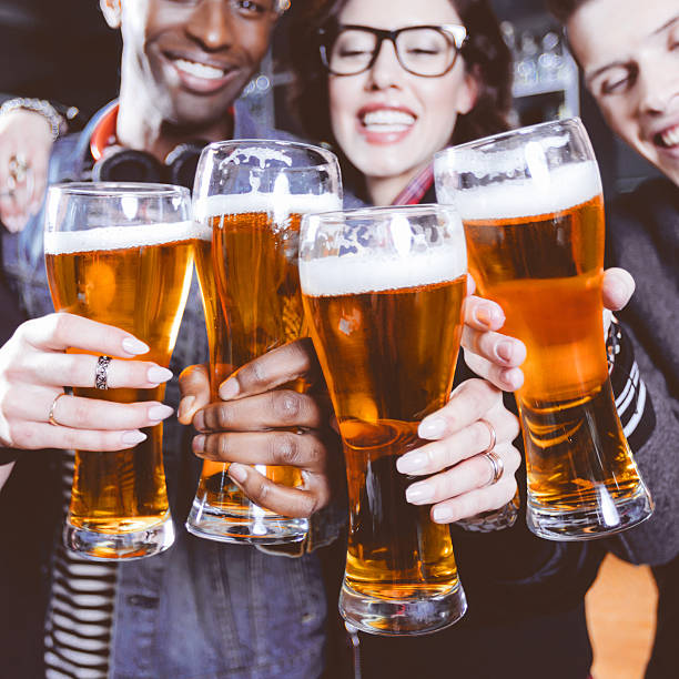istock Friends toasting with beer in a pub 625705722