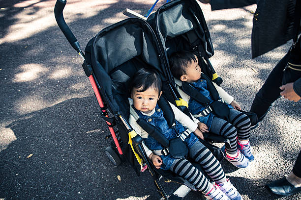 380+ Twin Stroller Stock Photos, Pictures & Royalty-Free Images - iStock | Double  stroller, Twin carriage, Triplets