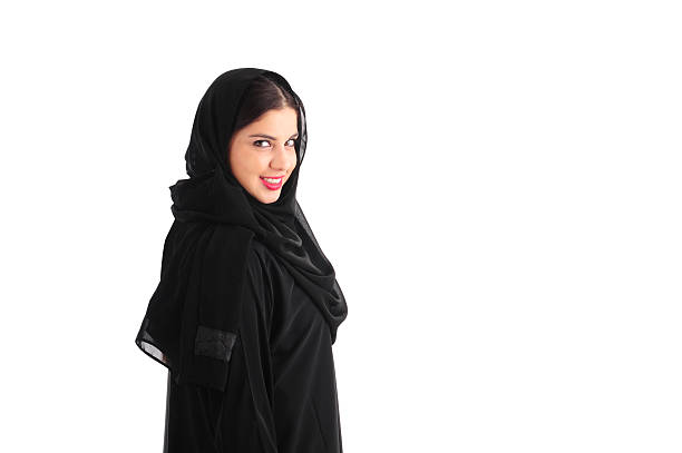 istock Attractive Arabian Woman Wearing Hijab standing over a white background 625715708