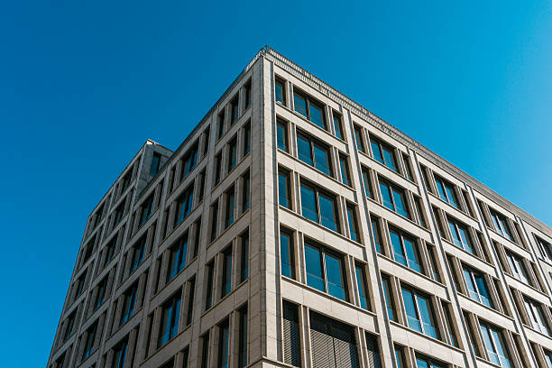 istock big office building with marmor facade and blue glass windows 625722284