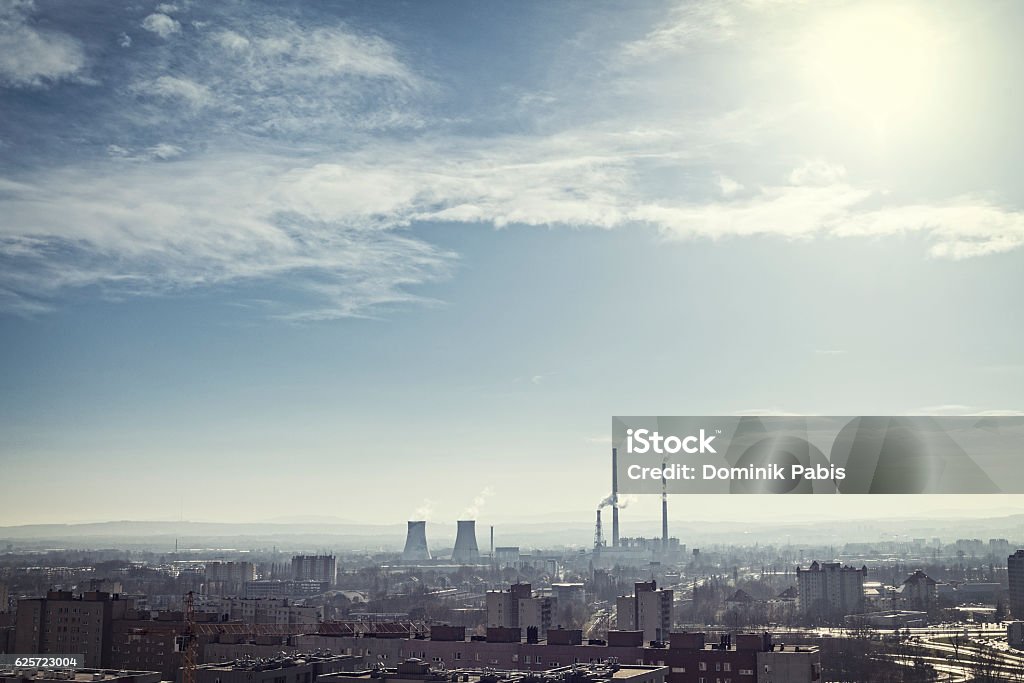 Coal-fired Power Station, factory in the middle of the city, panorama Coal-fired Power Station or factory in the middle of the city, air pollution, panorama, cityscape. Air Pollution Stock Photo