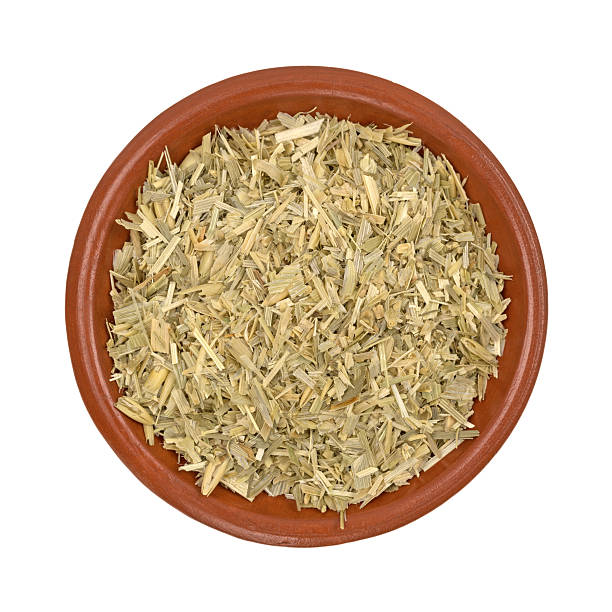 istock Bowl of oatstraw herb on a white background 625726140