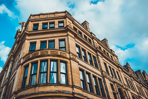 istock orange luxury building with beautiful blue windows 625727486