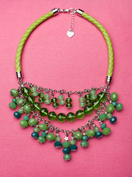 istock Green Leather Necklace With Monochromatic Green Pendants 625727516