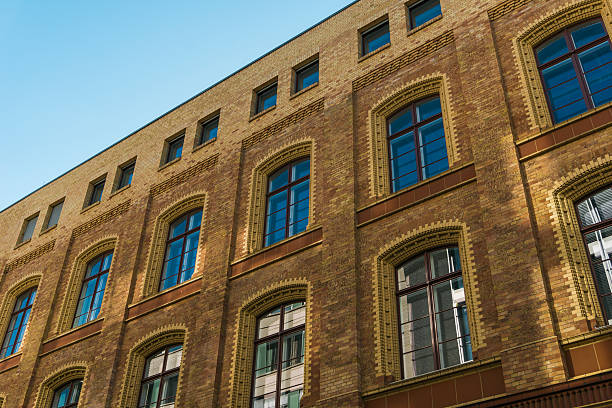 istock old brick facade of historical building 625728066