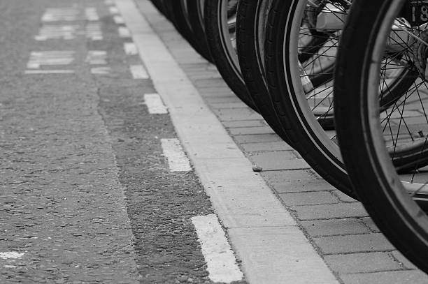 istock Bicycles parked and lined up in a row 625734070