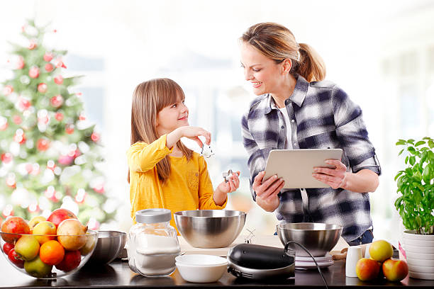 istock Mother and daughter at christmas 625736910