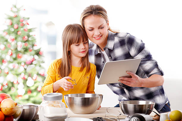 istock Mother and daughter at christmas 625738408