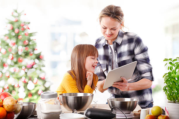 istock Mother and daughter at christmas 625738662
