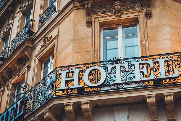 istock Hotel sign on ornate wrought iron work 625739364